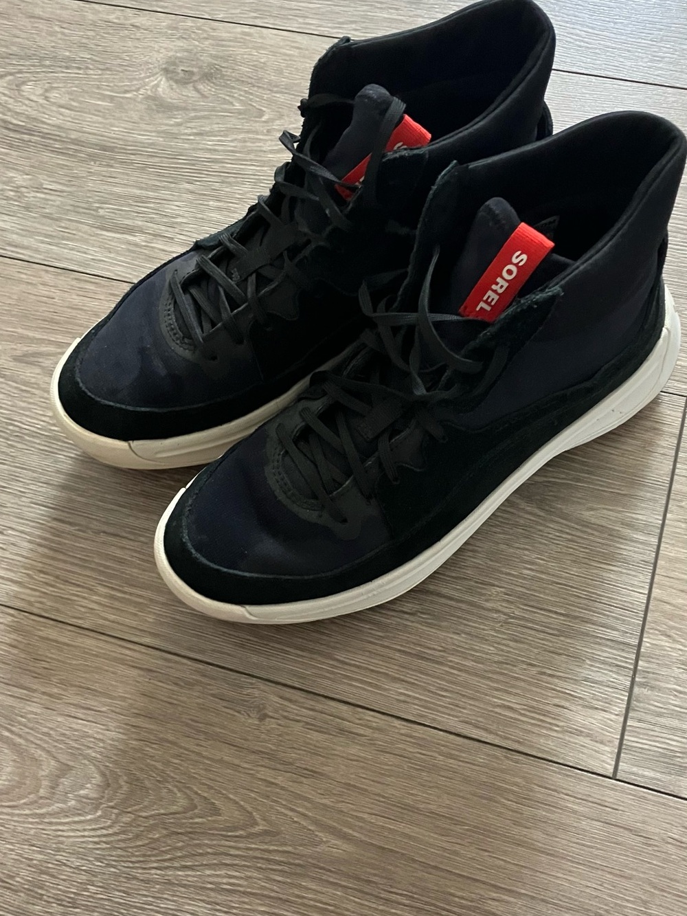 SOREL Black High-Top Sneakers with White Sole and Red Logo Tab